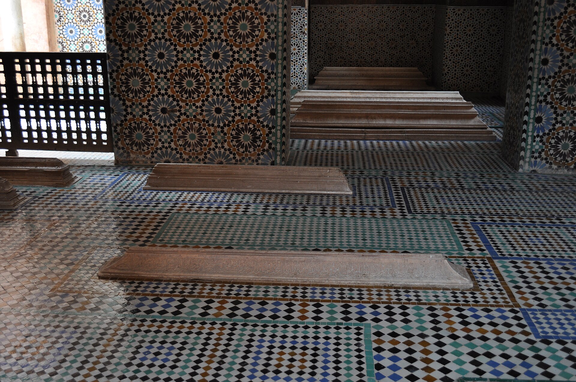 Tilework and grave markers inside a Saadian mausoleum