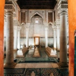 View through a decorated doorway into the Hall of the Twelve Columns